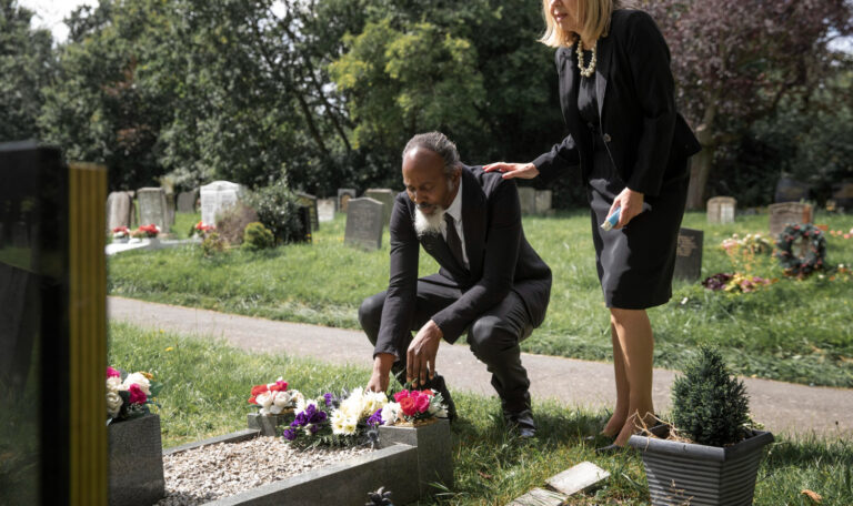 "Pastor officiating a funeral service at Thunders Tabernacle Ministry of Christ, offering support and spiritual guidance to grieving families