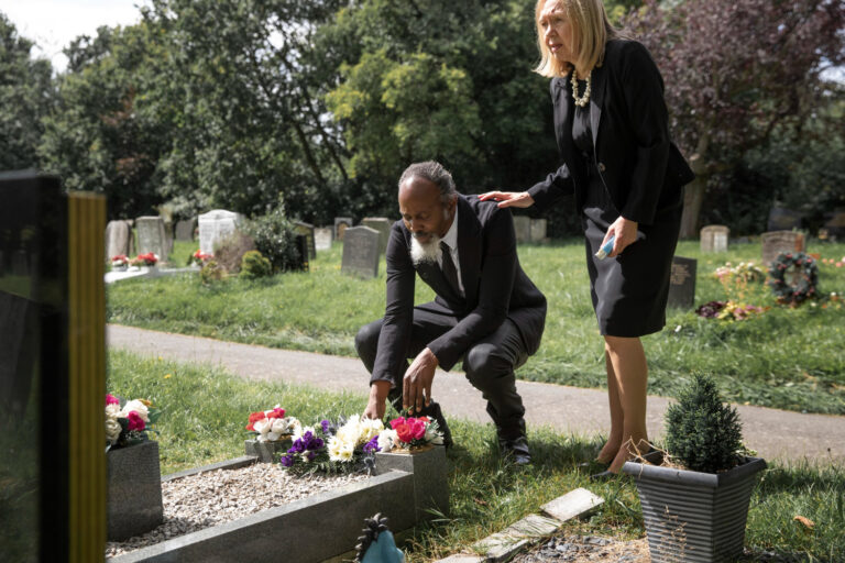 "Pastor officiating a funeral service at Thunders Tabernacle Ministry of Christ, offering support and spiritual guidance to grieving families
