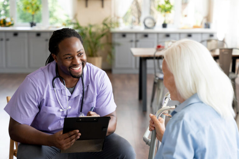 Volunteer ministering to elderly resident in a nursing home, providing spiritual encouragement and companionship through prayer and conversation