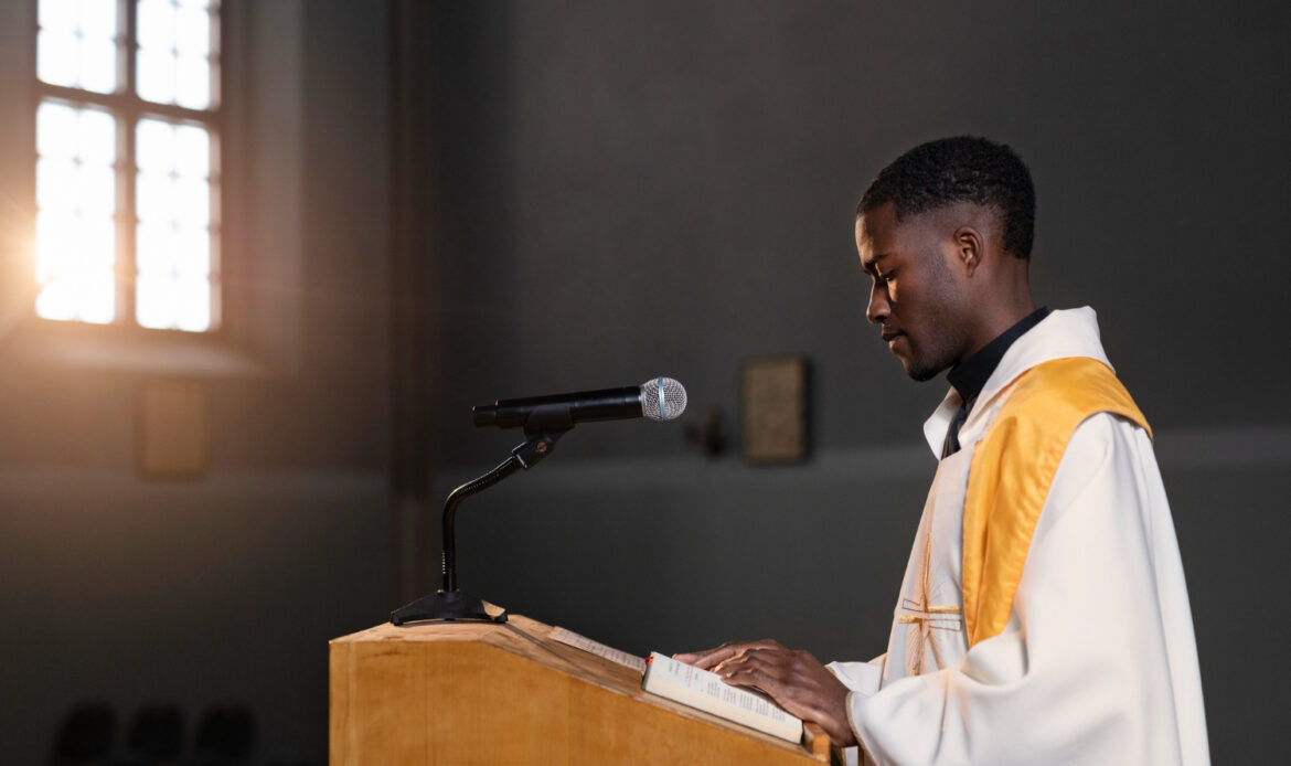 Young male priest preaching in the Thunders Tabernacle Ministry church